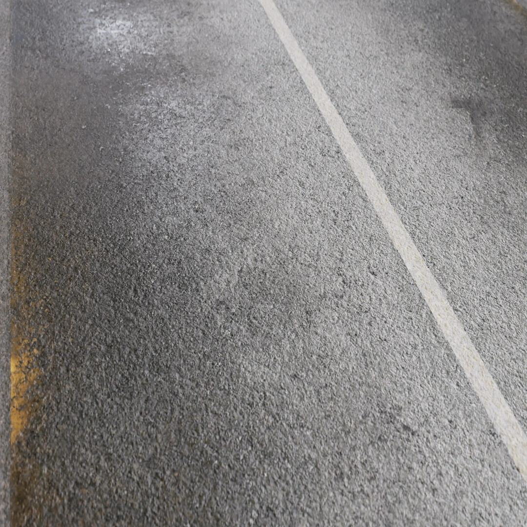Two Lane Rain Soaked Grey Asphalt Texture